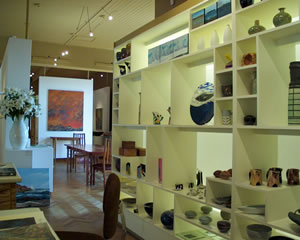 Items on shelves in gallery